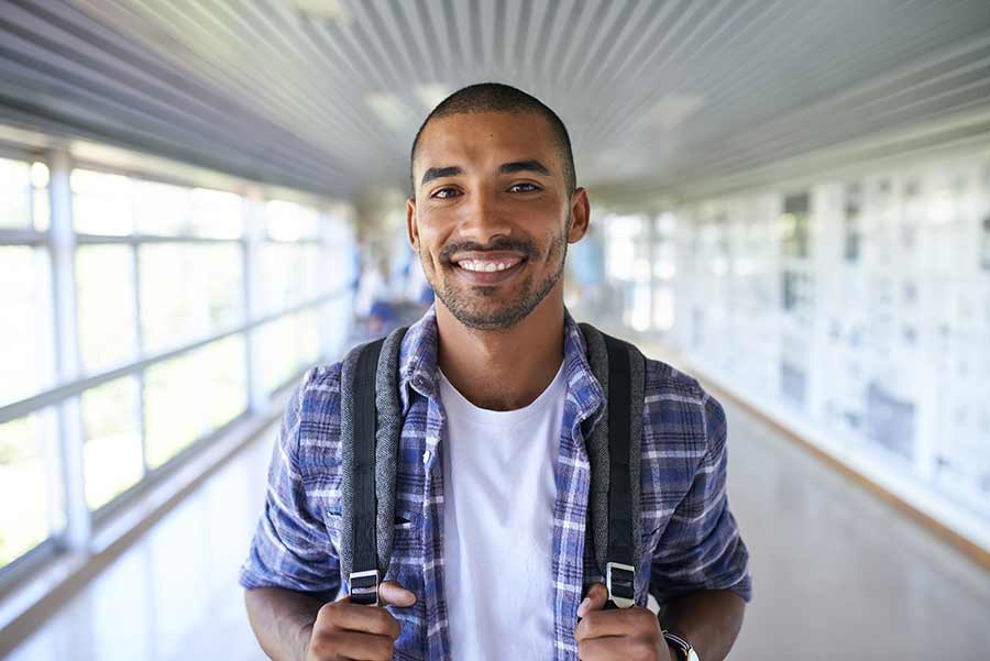 Young college man smiling