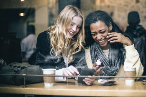 Friends sharing moments via phone