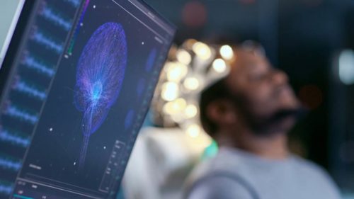 Man analyzing brain visualization digitally