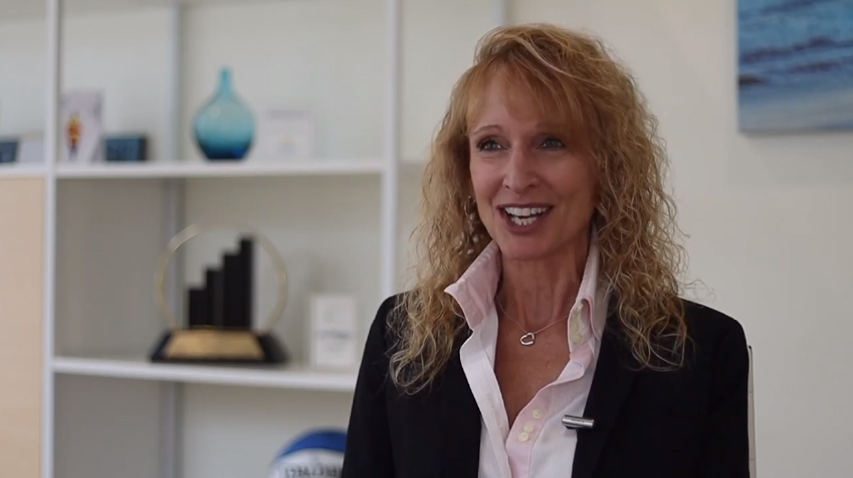 Chief Clinical Officer, Anna Ciulla, smiling during a conversation.