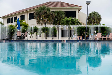 A close up of the large pool at Beach House recovery Center available to our clients as part of the facilities here.