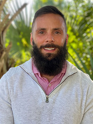 A headshot of Danny Mills, an admissions counselor at Beach House Recovery Center.