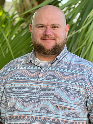 A headshot of Chase Addy, an admissions counselor at Beach House Recovery Center.