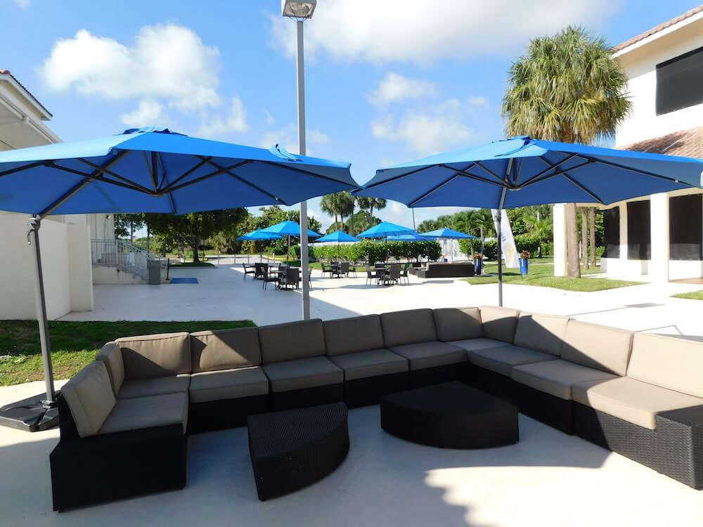 The outdoor seating area at Beach House Recovery center with comfortable outdoor couches and tables.