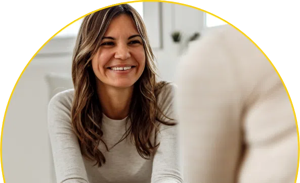 Women smiling and enjoying their conversation