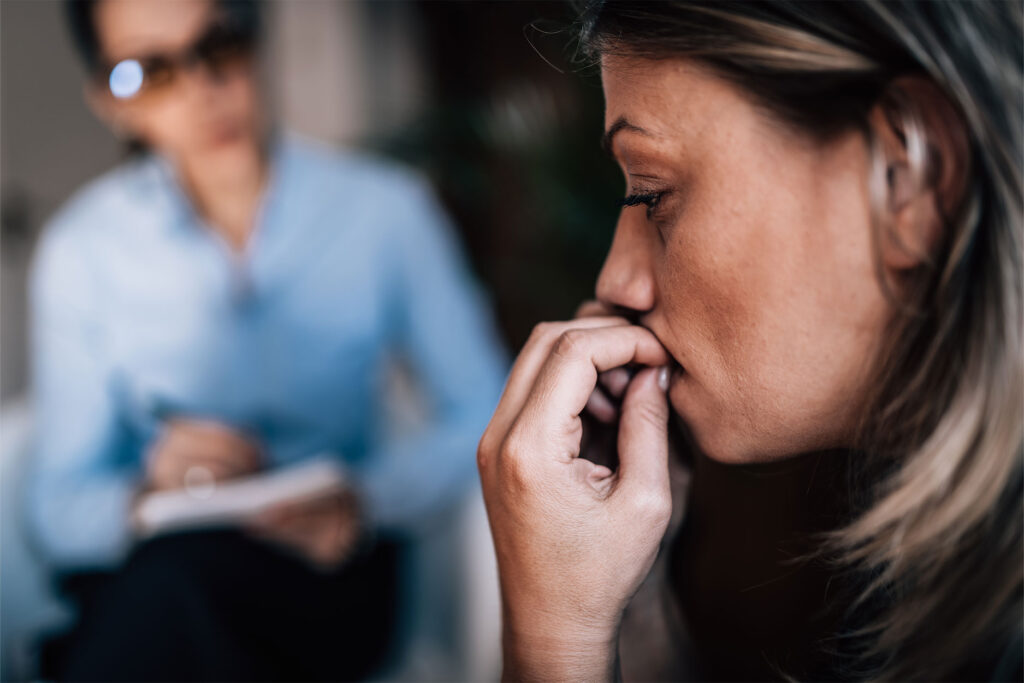 Close up of anxious woman