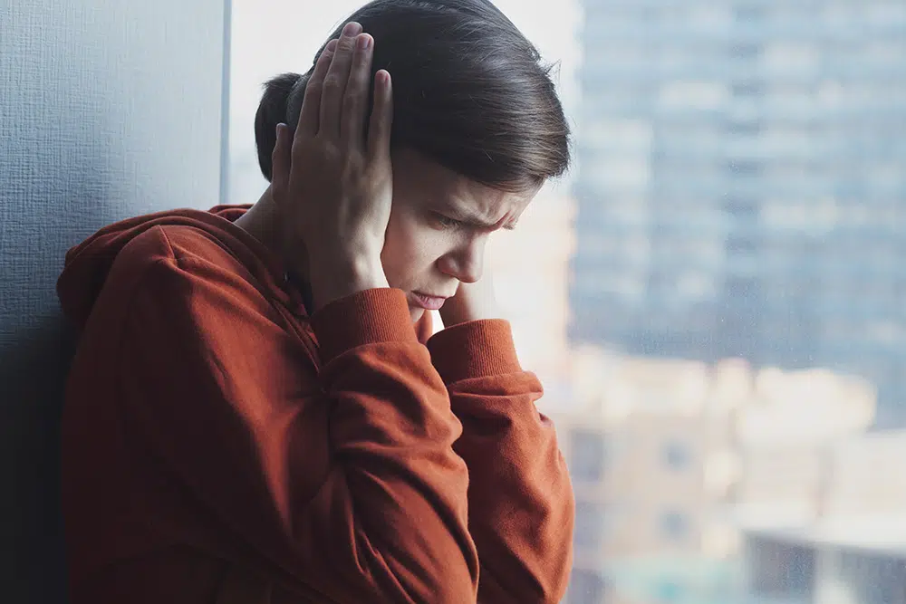 Woman overing her ears