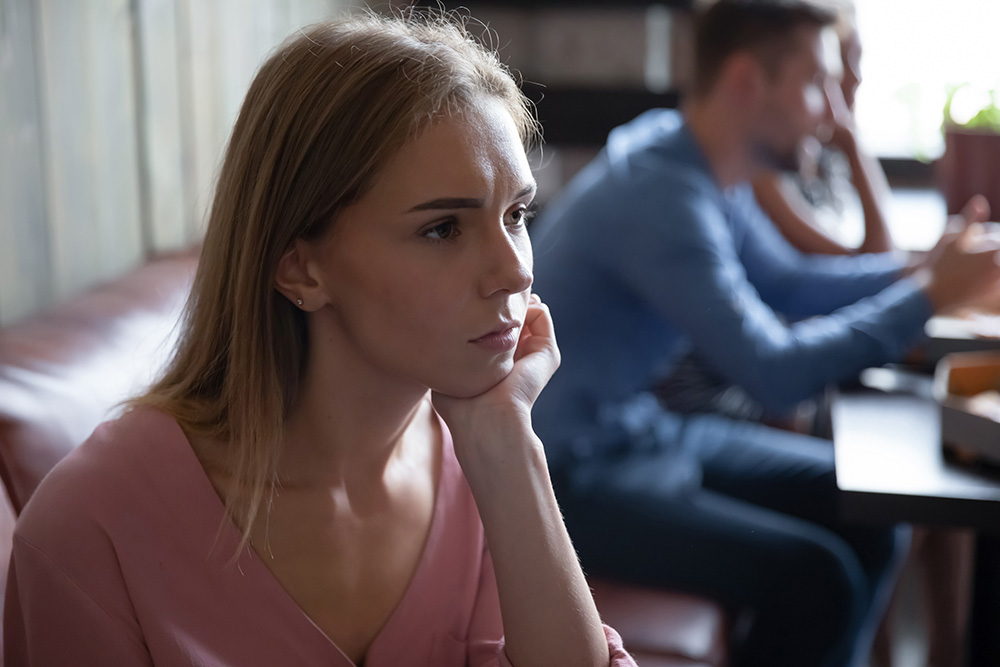 woman sitting alone