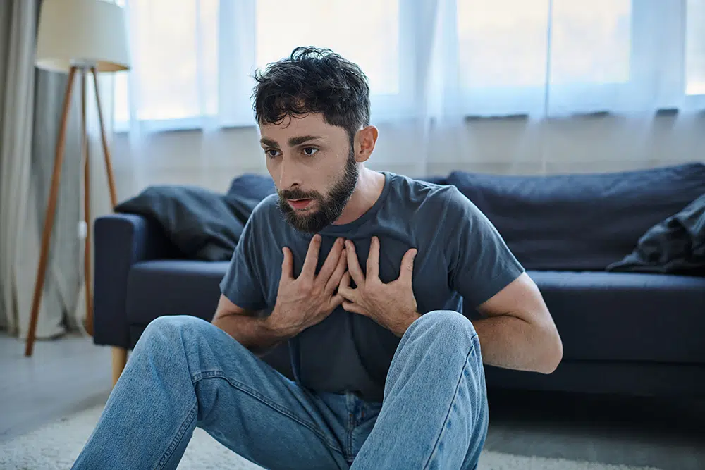 man feeling panicky