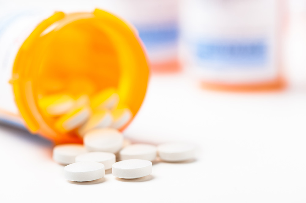 Open bottle of prescription pills